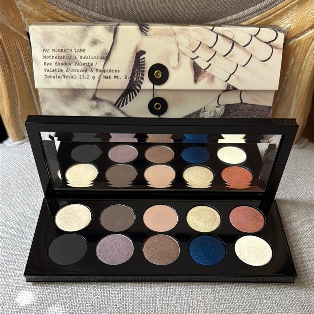 Pat McGrath Eyeshadow Palette with Blue, Gold, and Pink Shades